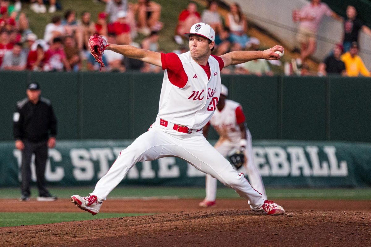 Junior left-hand pitcher Ryan Marohn winds up to throw a pitch during the game against Duke at Doak Field at Dail Park on Friday, April 10, 2026. Marohn pitched 5.2 innings, recording nine strikeouts. The Wolfpack beat the Blue Devils 10-4.