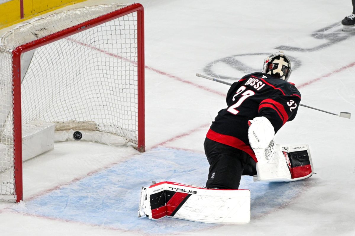 Goalie Brandon Bussi misses a save during the game versus the Boston Bruins at the Lenovo Center on Tuesday, April 7, 2026. Bussi had 16 saves. The Canes defeated the Bruins in OT 6-5.