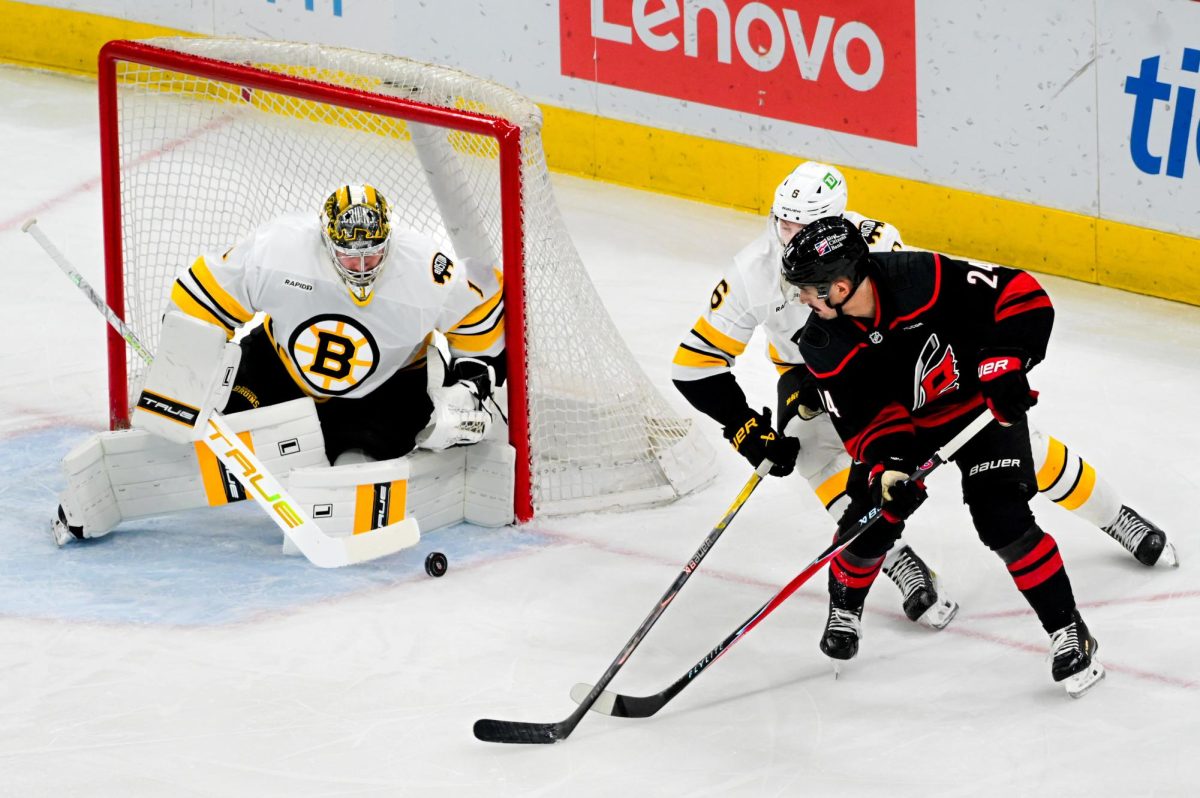 Center Seth Jarvis attempts to score during the game versus the Boston Bruins at the Lenovo Center on Tuesday, April 7, 2026. The Canes defeated the Bruins in OT 6-5.