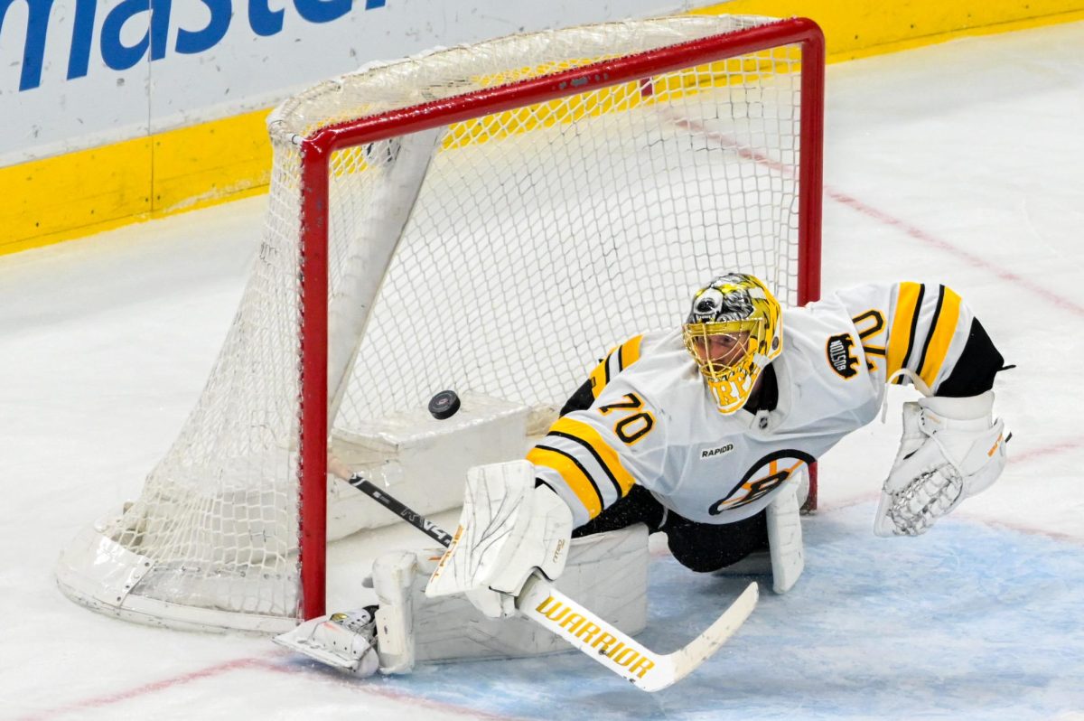 Boston goalie Joonas Korpisalo dives to make a save during the game versus the Carolina Hurricanes at the Lenovo Center on Tuesday, April 7, 2026. Korpisalo had 16 saves. The Canes defeated the Bruins in OT 6-5.