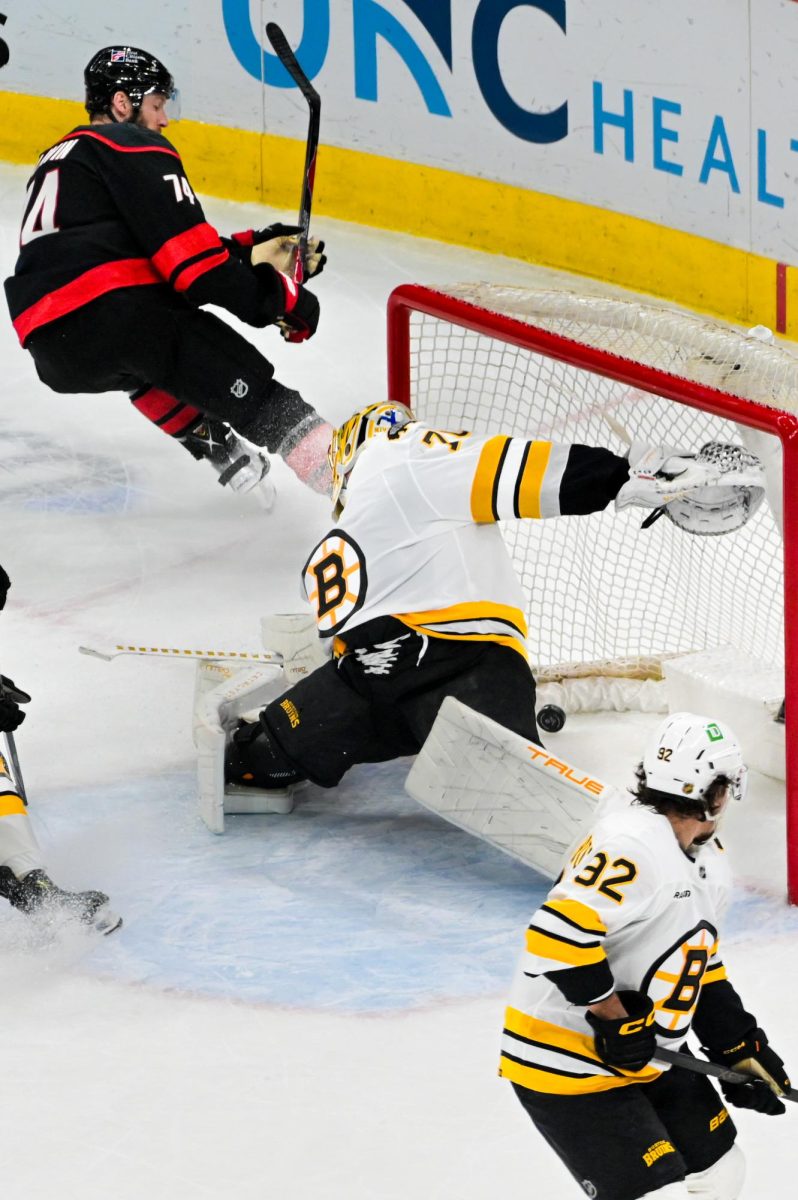 Defenseman Jaccob Slavin scores the OT goal against the Boston Bruins at the Lenovo Center on Tuesday, April 7, 2026. The Canes took the win 6-5.