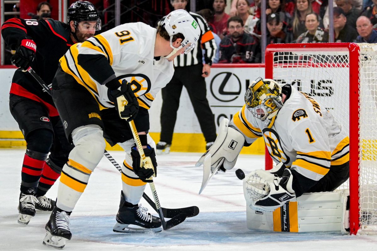 Boston goalie Jeremy Swayman saves a shot during the game versus the Carolina Hurricanes at the Lenovo Center on Tuesday, April 7, 2026. Swayman had 18 saves before being exchanged with Bruins goalie Joonas Korpisalo. The Canes defeated the Bruins in OT 6-5.