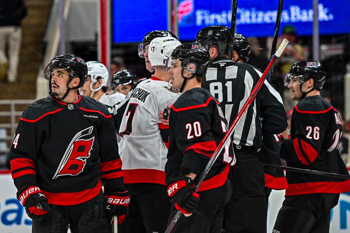 Centers Seth Jarvis and Sebastian Aho check the replay during Game One of the Eastern Conference Playoffs against the Ottawa Senators at the Lenovo Center on Saturday, April. 18, 2026. The Hurricanes defeated the Senators 2-0.