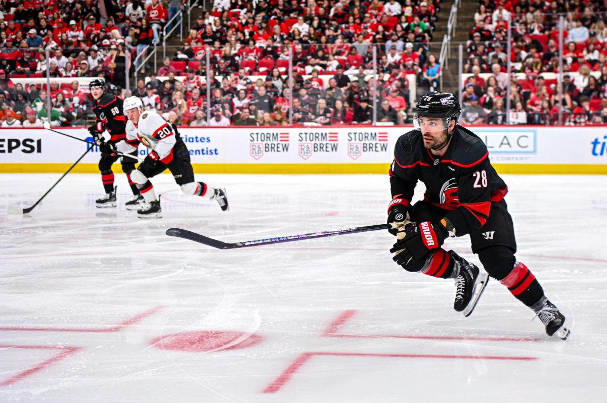 Left wing William Carrier rushes to the puck during Game One of the Eastern Conference Playoffs against the Ottawa Senators at the Lenovo Center on Saturday, April. 18, 2026.  The Hurricanes defeated the Senators 2-0.