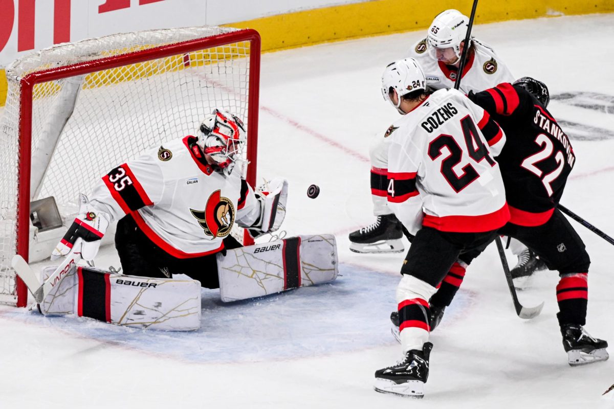 Center Logan Stankoven attempts to score during Game One of the Eastern Conference Playoffs against the Ottawa Senators at the Lenovo Center on Saturday, April. 18, 2026. Stankoven later gave Carolina the lead in the second period through a successful shot. The Hurricanes defeated the Senators 2-0.