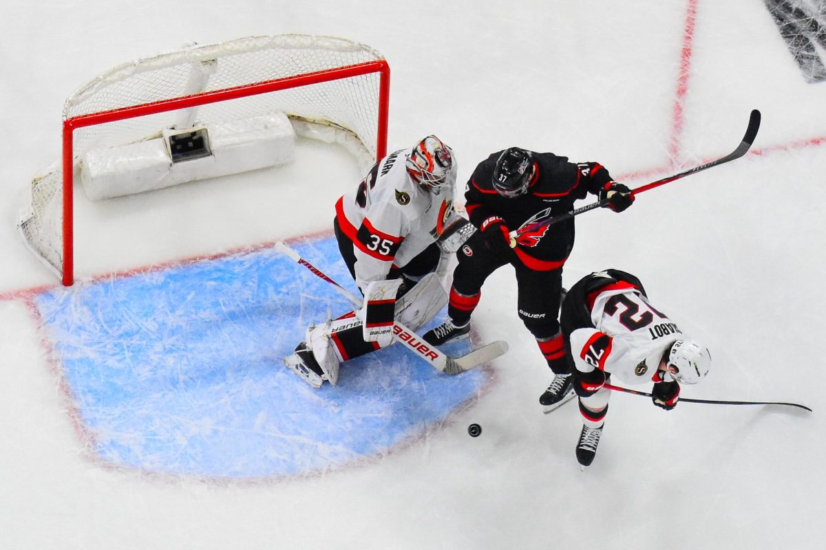 Right wing Andrei Svechnikov attempts to redirect the puck during Game One of the Eastern Conference Playoffs against the Ottawa Senators at the Lenovo Center on Saturday, April. 18, 2026.  The Hurricanes defeated the Senators 2-0.