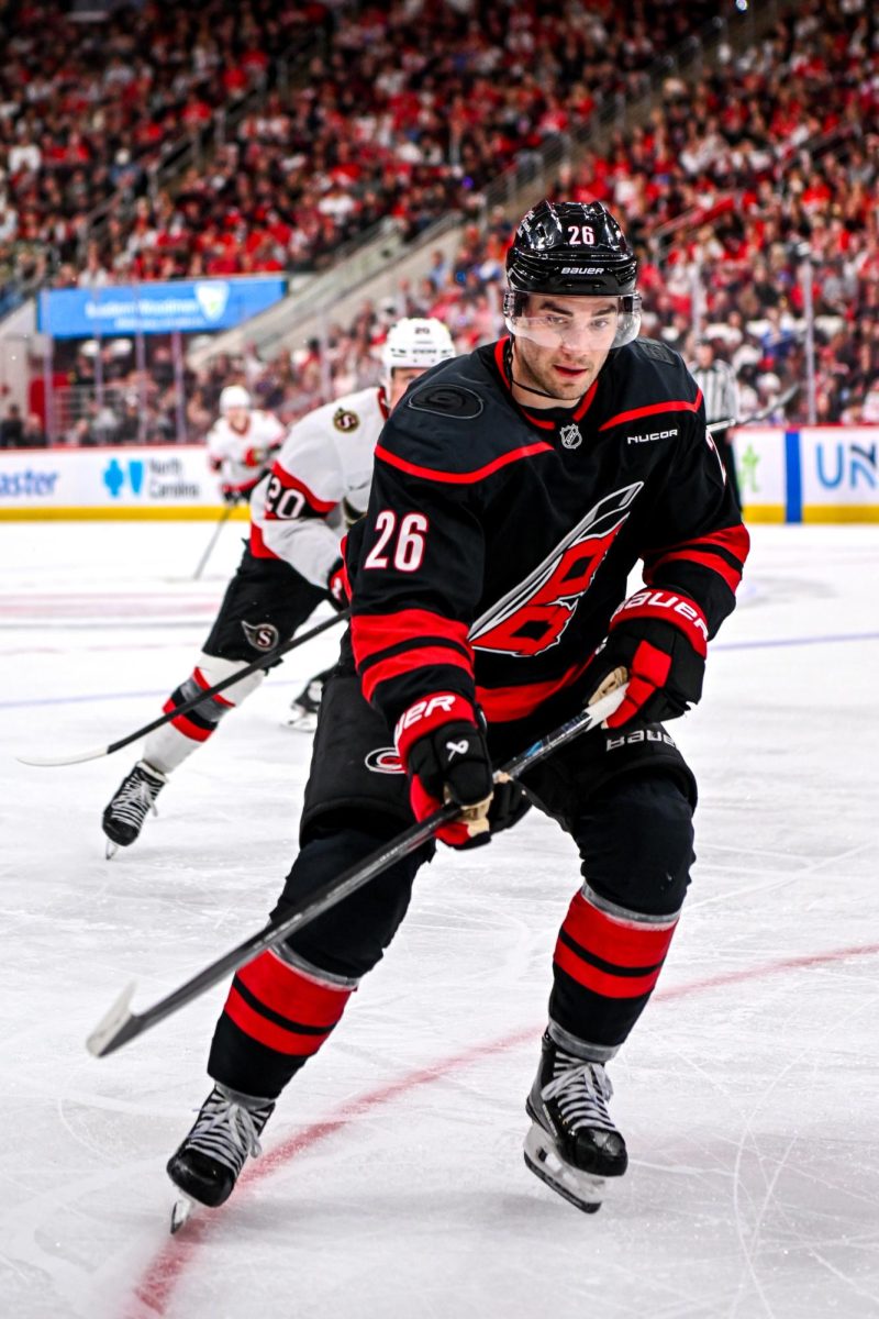 Defenseman Sean Walker lands eyes on the puck during Game One of the Eastern Conference Playoffs against the Ottawa Senators at the Lenovo Center on Saturday, April. 18, 2026. The Hurricanes defeated the Senators 2-0.