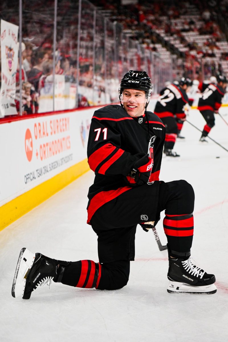 Left wing Taylor Hall smiles at the team’s families who surrounded the glass to watch warm-ups preceding Game One of the Eastern Conference Playoffs against the Ottawa Senators at the Lenovo Center on Saturday, April. 18, 2026. Hall had one goal and one assist. The Hurricanes defeated the Senators 2-0.