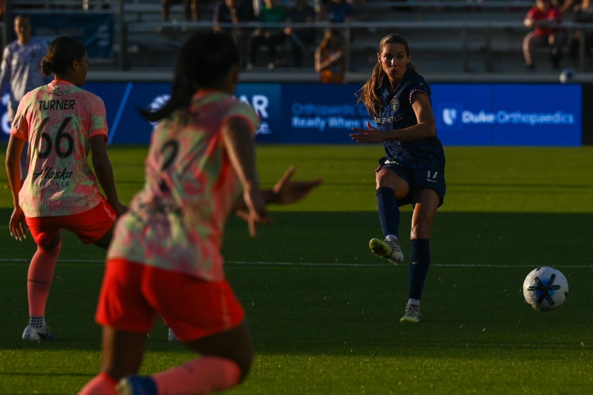 Midfielder Dani Weatherholt passes the ball to teammate during the game versus the Portland Thorns at the WakeMed Soccer Park on Saturday, April. 4, 2026. The NC Courage drew the Portland Thorns 2-2.