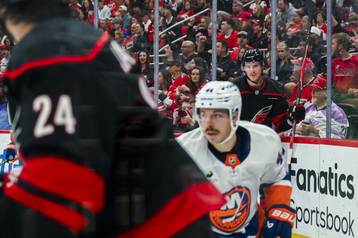 Right wing Andrei Svechnikov looks at center Seth Jarvis after Jarvis' goal during the game versus the New York Islanders at the Lenovo Center on Saturday, April 4, 2026. Jarvis scored two goals for the Hurricanes. The Hurricanes beat the Islanders 4-3.