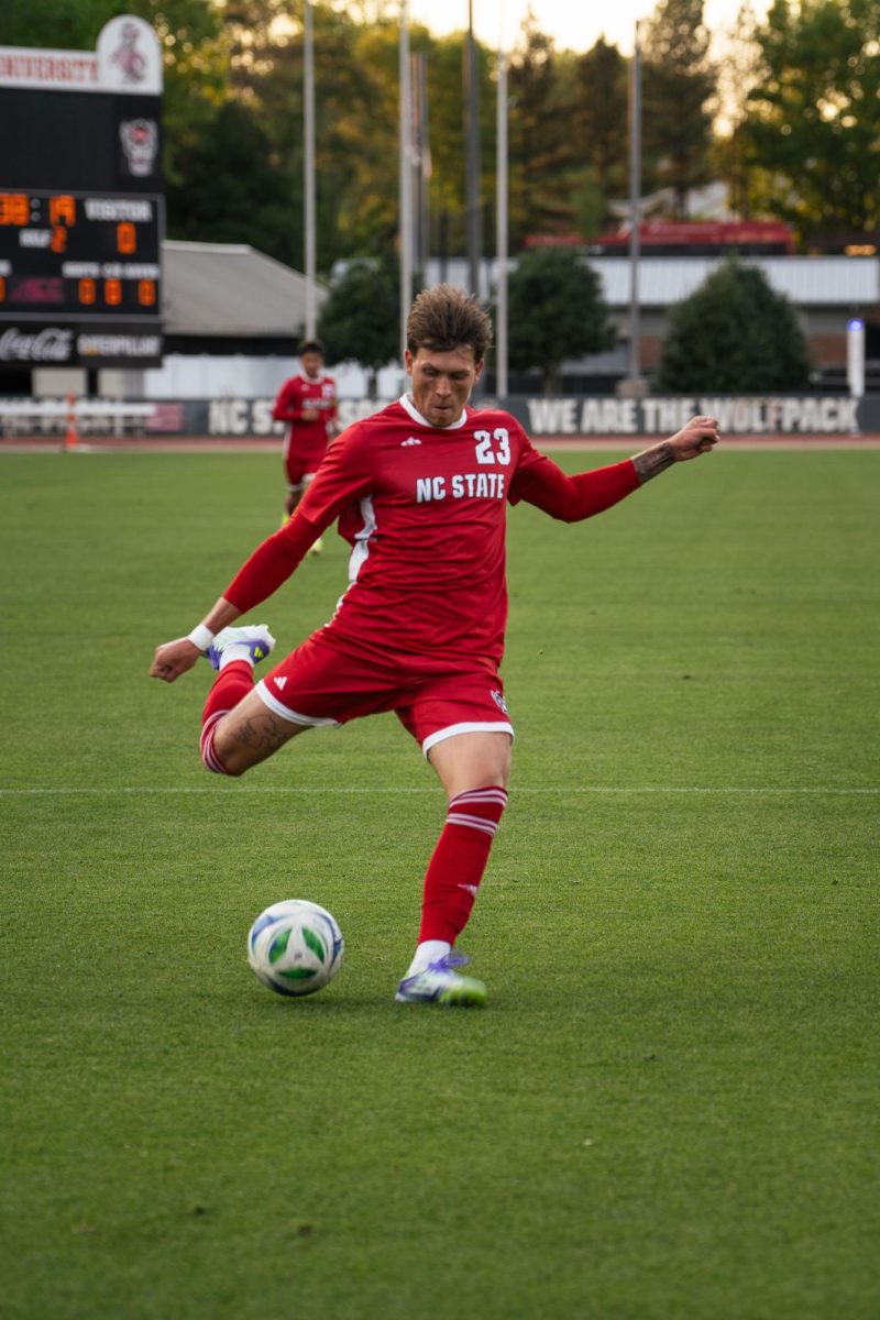 Senior forward Austin Bush shoots the ball during the game against Wake Forest at Dail Soccer Field on Tuesday, April 7, 2026. NC State beat Wake Forest 3-0.
