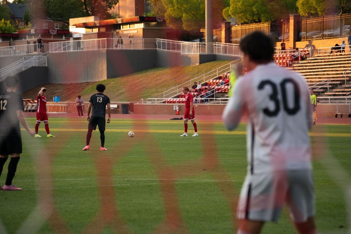 Senior midfielder Tyler Caton prepares for his free kick during the game against Wake Forest at Dail Soccer Field on Tuesday, April 7, 2026. NC State beat Wake Forest 3-0.