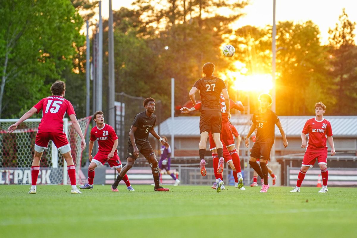 NC State and Wake Forest battle to win the ball during the game against Wake Forest at Dail Soccer Field on Tuesday, April 7, 2026. NC State beat Wake Forest 3-0.