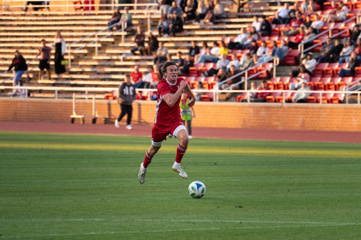 Redshirt senior forward Aidan Payne advances the ball during the game against Wake Forest at Dail Soccer Field on Tuesday, April 7, 2026. NC State beat Wake Forest 3-0.