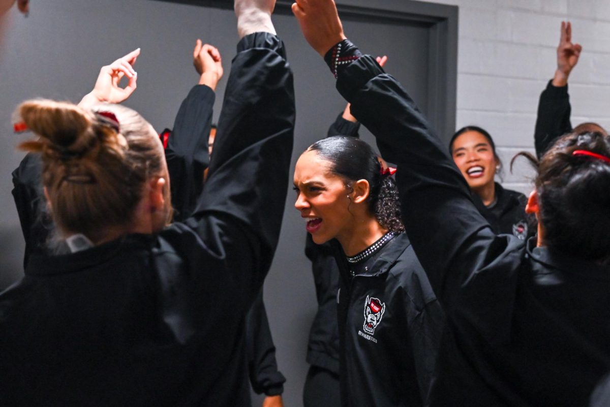 Sophomore Ava Myers hypes up teammates before the NCAA Regional meet against Arkansas, Mizzou, and Maryland at Memorial Coliseum on Friday, Apr. 3, 2026. The Wolfpack fell to the Razorbacks and Tigers with a score of 195.700, marking the end of their 2026 season.