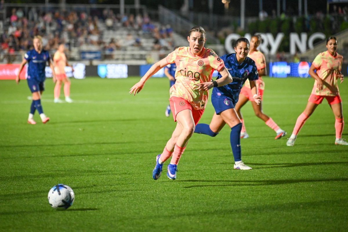 Portland Thorns midfielder Olivia Moultrie and midfielder Riley Jackson run for the ball during the game between the North Carolina Courage and Portland Thorns at First Horizon Stadium on Saturday, Apr. 4, 2026. Courage tied the thorns 2-2.