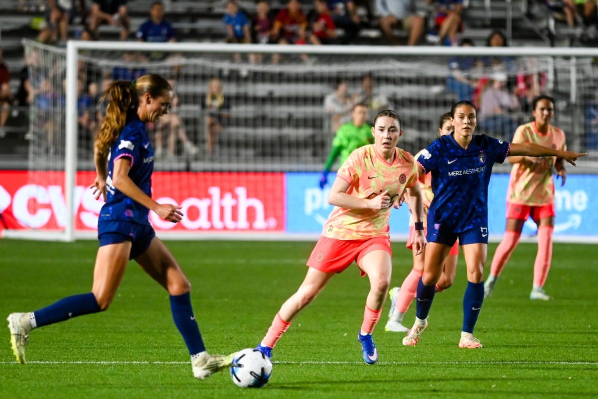 Portland Thorns midfielder Olivia Moultrie and midfielder Riley Jackson watch midfielder Dani Weatherholt dribble the ball during the game between the North Carolina Courage and Portland Thorns at First Horizon Stadium on Saturday, Apr. 4, 2026. Courage tied the thorns 2-2.