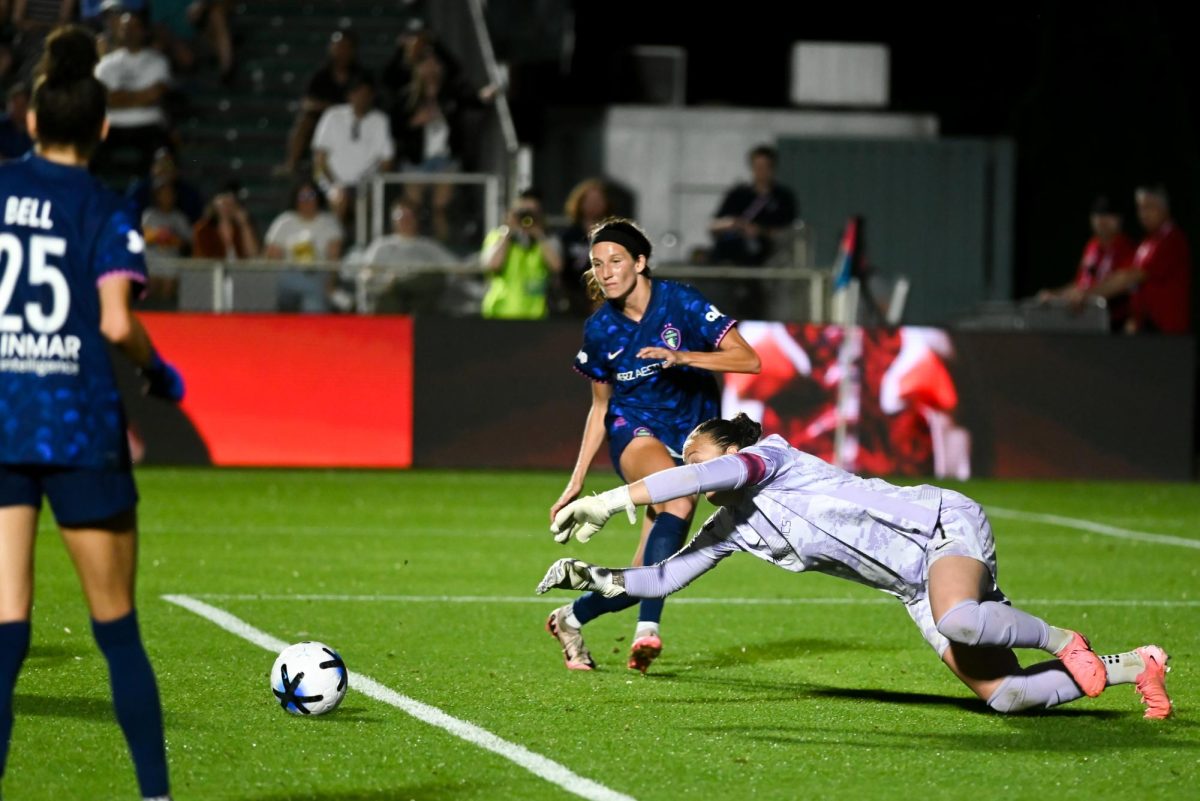 Goalkeeper Kailen Sheridan dives for the ball during the game between the North Carolina Courage and Portland Thorns at First Horizon Stadium on Saturday, Apr. 4, 2026. Courage tied the thorns 2-2.