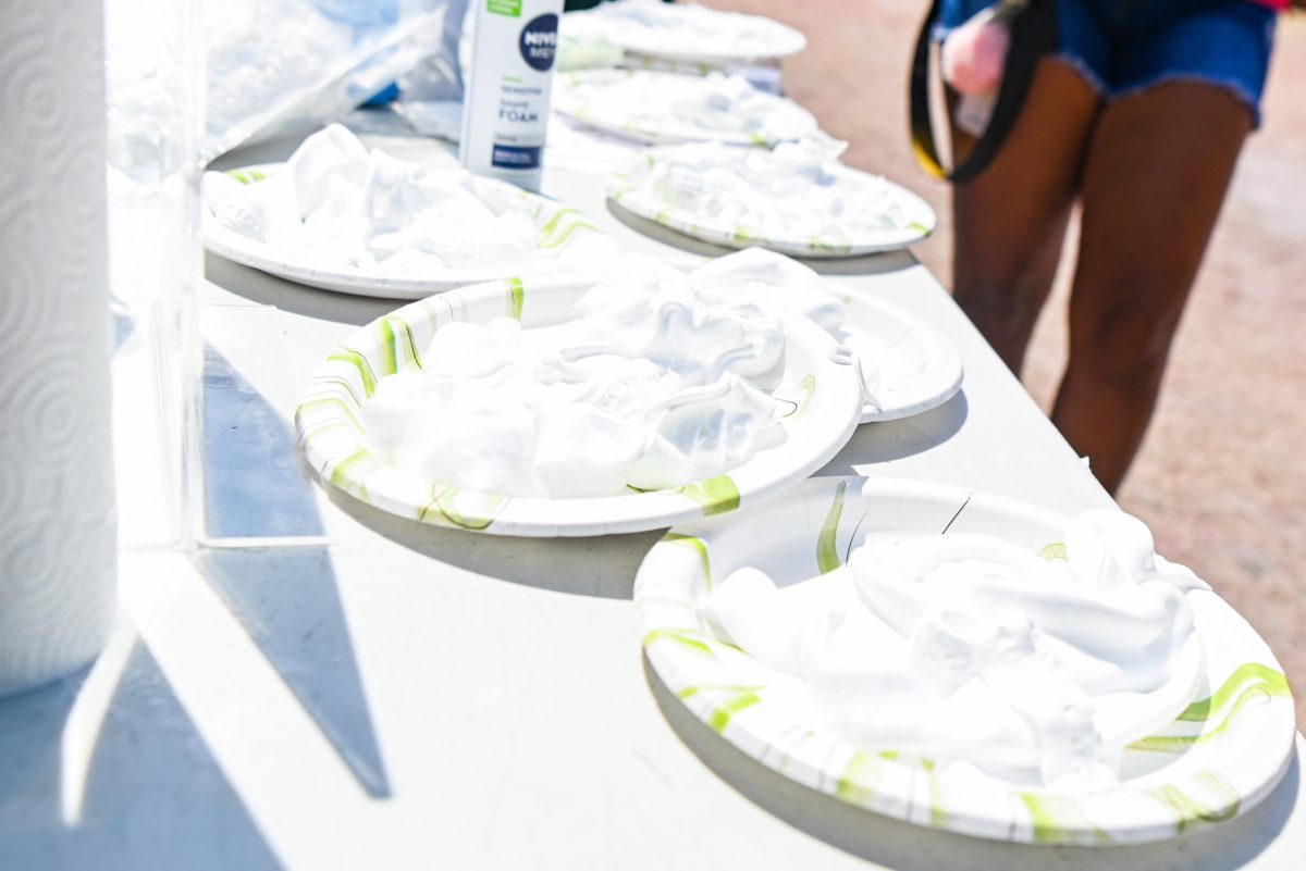 Shaving cream-filled plates lined the table awaiting to be thrown during the Pie BSB Eboard event at Stafford Commons on Tuesday, April. 17, 2026. The pie the Black Student Board Eboard event is part of Pan-African Week, a weeklong celebration of Pan-Africanism that promotes unity among students through fun activities designed for the black community.