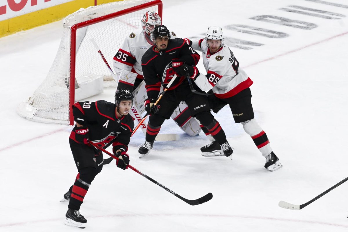 Centers Seth Jarvis and Sebastian Aho watch the puck during the round one playoff game versus the Ottawa Senators at the Lenovo Center on Monday, April 20, 2026. Aho scored one goal for the Hurricanes. The Hurricanes beat the Senators 3-2 in double overtime.