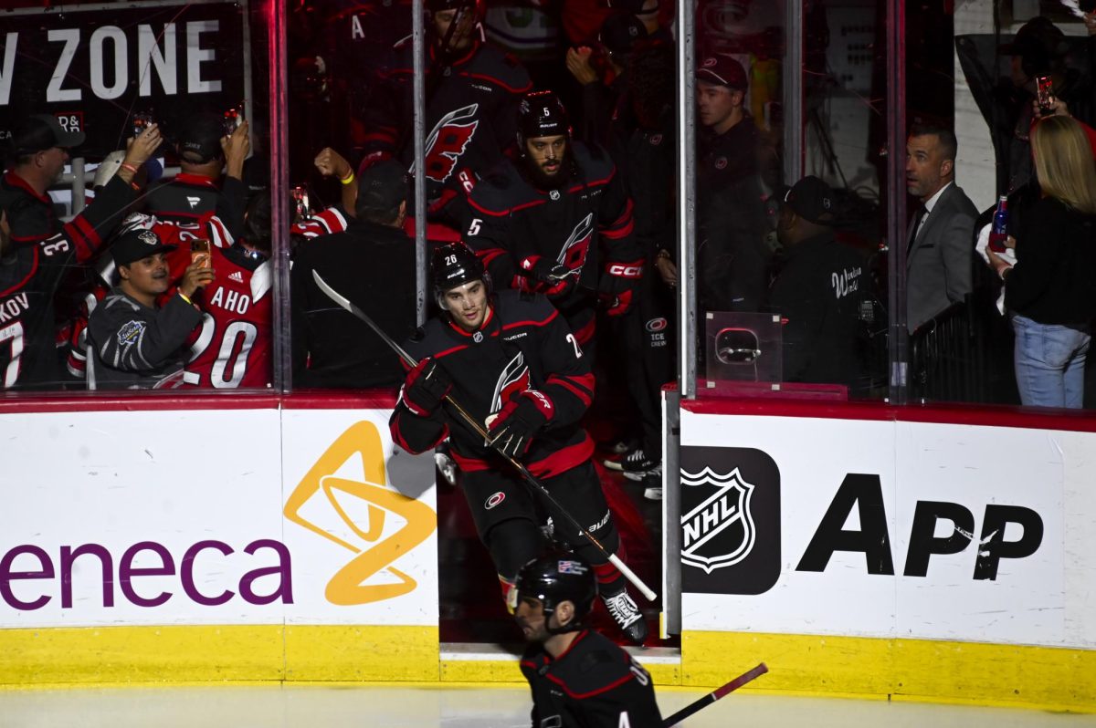 Hurricanes players run onto the ice during the round one playoff game versus the Ottawa Senators at the Lenovo Center on Monday, April 20, 2026. The Hurricanes beat the Senators 3-2 in double overtime.
