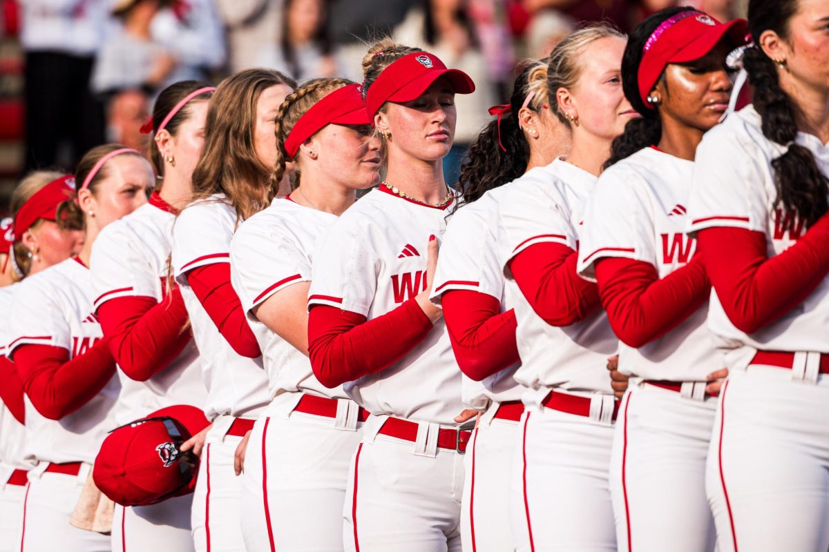 Senior right-handed pitcher Rylee Wyman stands and listens for the National Anthem before the game against Arizona State at Dail Softball Stadium on Wednesday, March 25, 2026. The Wolfpack fell to the Sun Devils 7-3.
