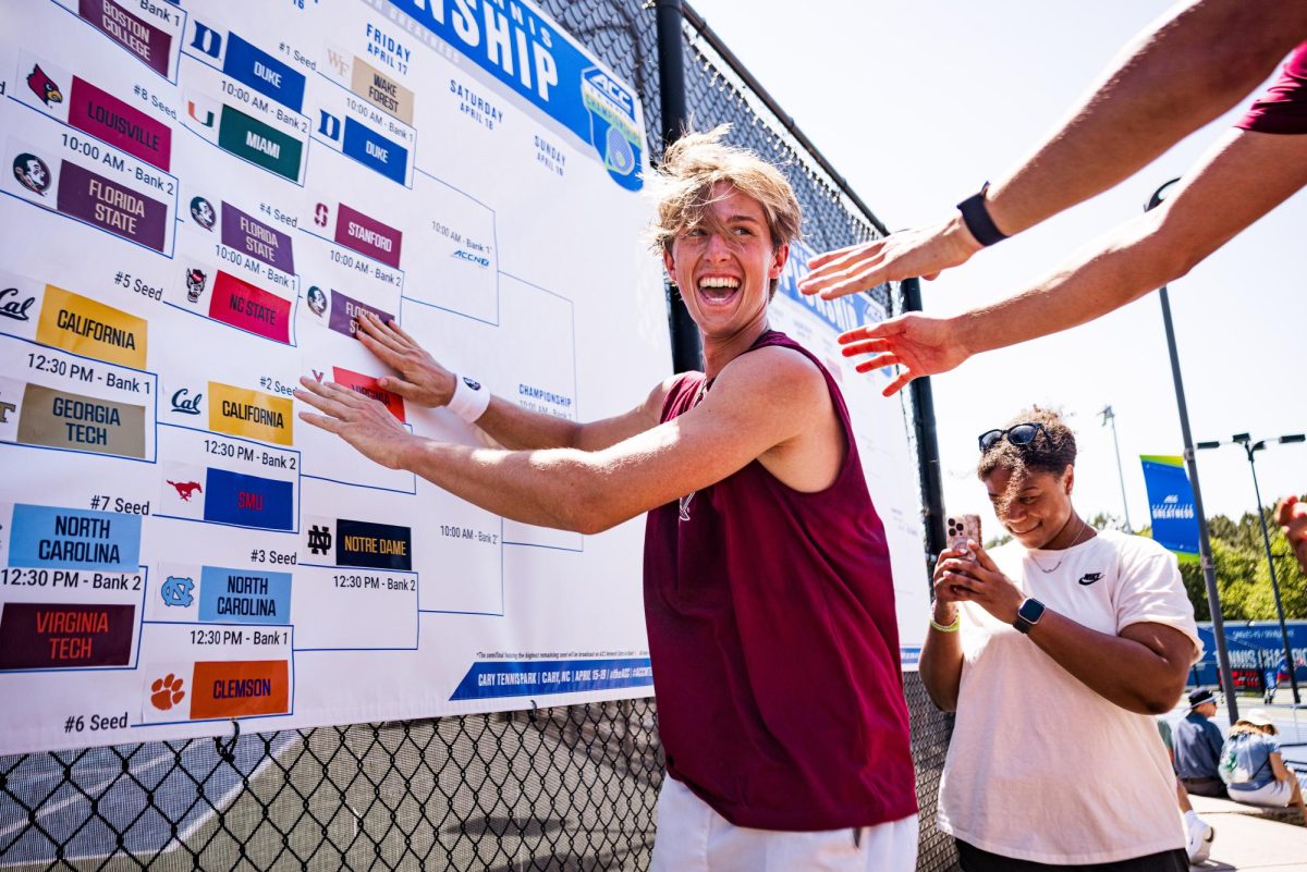 Florida State freshman Gabor Hornung puts the FSU sticker on the bracket after defeating NC State in the second round of the ACC Men's Tennis Championship at Cary Tennis Park on Thursday, April 16, 2026. The Wolfpack lost to the Seminoles 3-4.