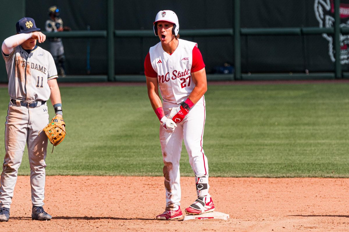 Junior infielder Chris Chris McHugh reacts after hitting a double during the game against Notre Dame at Doak Field at Dail Park on Saturday, April 4, 2026. NC State defeated Notre Dame 7-6.