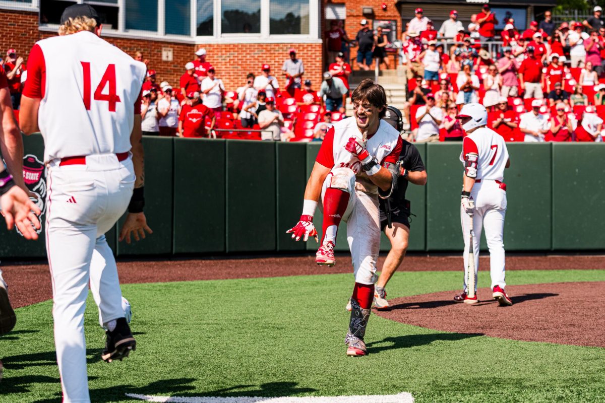 Sophomore infielder Mikey Ryan celebrates after hitting a home run during the game against Notre Dame at Doak Field at Dail Park on Saturday, April 4, 2026. NC State defeated Notre Dame 7-6.