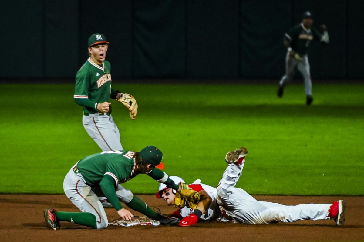 Sophomore outfielder Ty Head dives into second during the game against Miami in Doak Field at Dail Park on Saturday, May 2, 2026. Head was called safe on the play after a lengthy review. The Wolfpack defeated the Hurricanes 12-7.