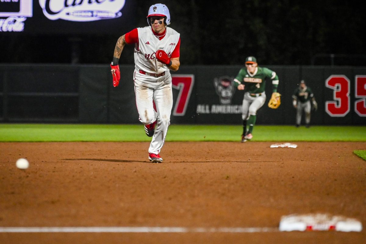 Sophomore outfielder Ty Head races to third during the game against Miami in Doak Field at Dail Park on Saturday, May 2, 2026. The Wolfpack defeated the Hurricanes 12-7.