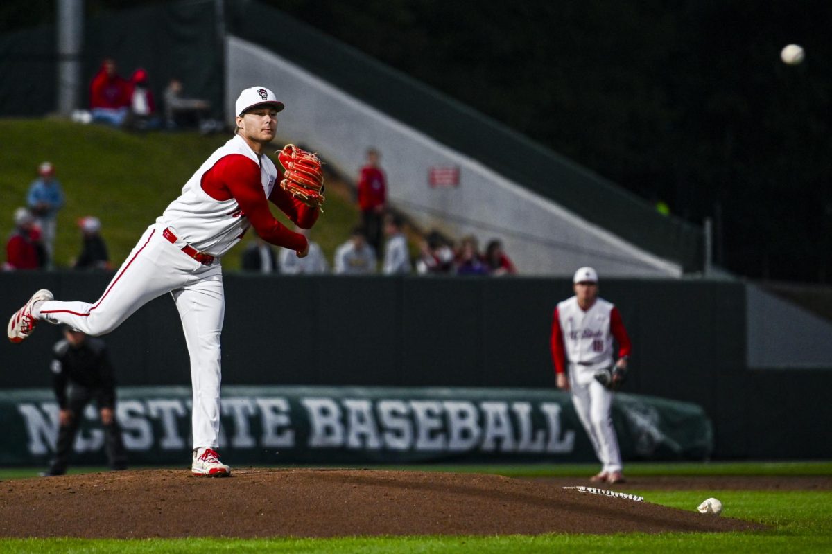 Sophomore right-handed pitcher Anderson Nance throws to first for the pickoff during the game against Miami in Doak Field at Dail Park on Saturday, May 2, 2026. Nance threw for 5.2 innings, recording nine strikeouts. The Wolfpack defeated the Hurricanes 12-7.