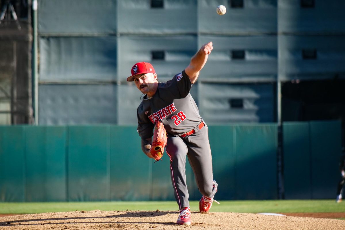 Junior left-handed pitcher Cooper Consiglio fires a pitch during the game against Stanford at Klein Field at Sunken Diamond on Friday, May 8, 2026. Consiglio threw six and a third innings, allowing two earned runs. The Wolfpack fell to the Cardinal 6-5. 