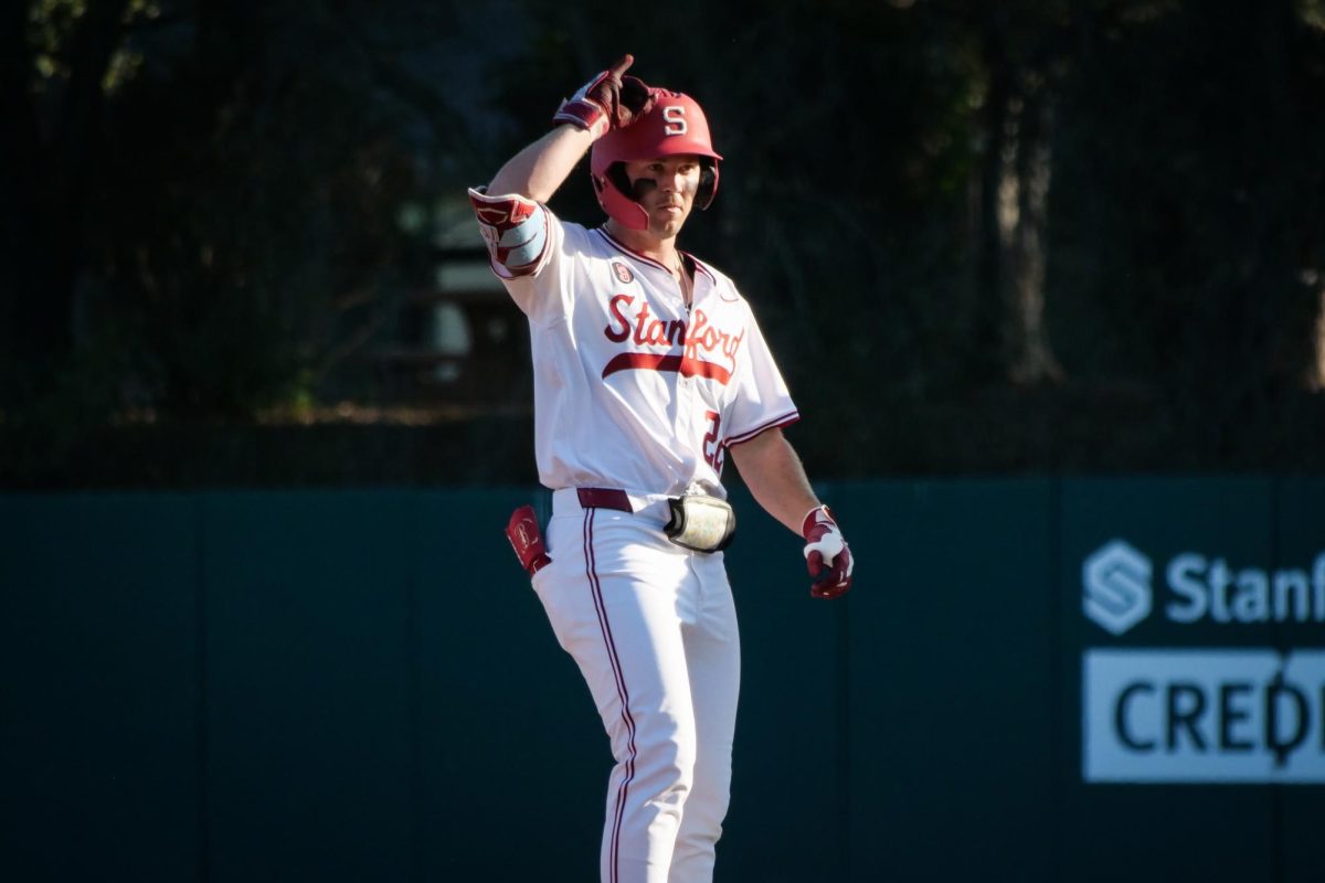 Senior outfielder Cort MacDonald gestures to the dugout after hitting a single during the game against NC State at Klein Field at Sunken Diamond on Friday, May 8, 2026. The Wolfpack fell to the Cardinal 6-5. 