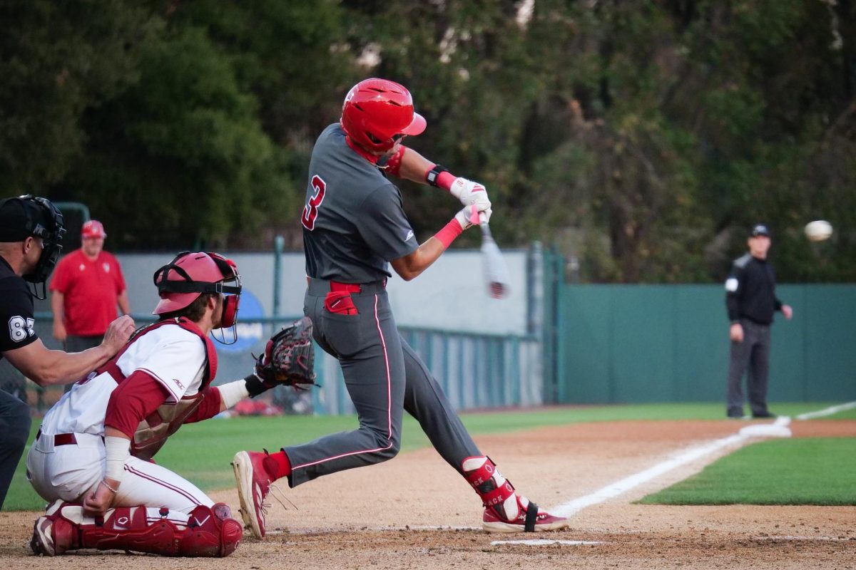 Freshman infielder Christian Serrano Barrels a ball during the game against Stanford at Klein Field at Sunken Diamond on Friday, May 8, 2026. Serrano went 2-for-4 in the game. The Wolfpack fell to the Cardinal 6-5. 