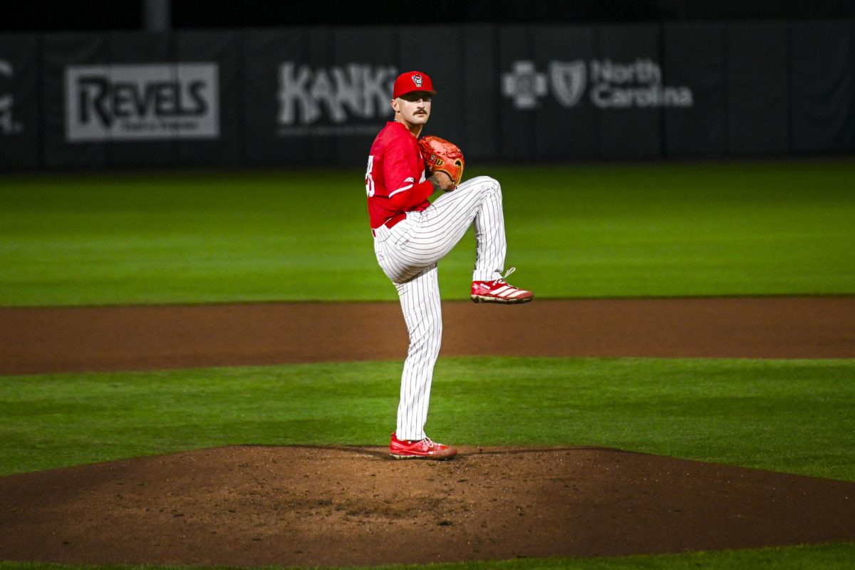 Junior left-handed pitcher Cooper Consiglio winds up a pitch during the second game of the doubleheader against Miami in Doak Field at Dail Park on Friday, May 1, 2026. Consiglio threw for six innings, recording nine strikeouts. The Wolfpack defeated the Hurricanes 13-6.