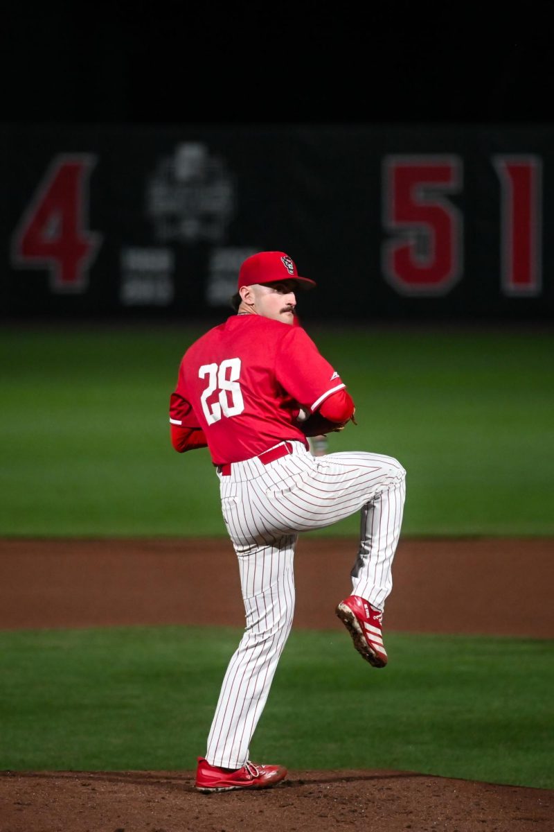 Junior left-handed pitcher Cooper Consiglio delivers a pitch during the second game of the doubleheader against Miami in Doak Field at Dail Park on Friday, May 1, 2026. Consiglio pitched 6.0 innings and recorded nine strikeouts. The Wolfpack beat the Hurricanes 13-6.