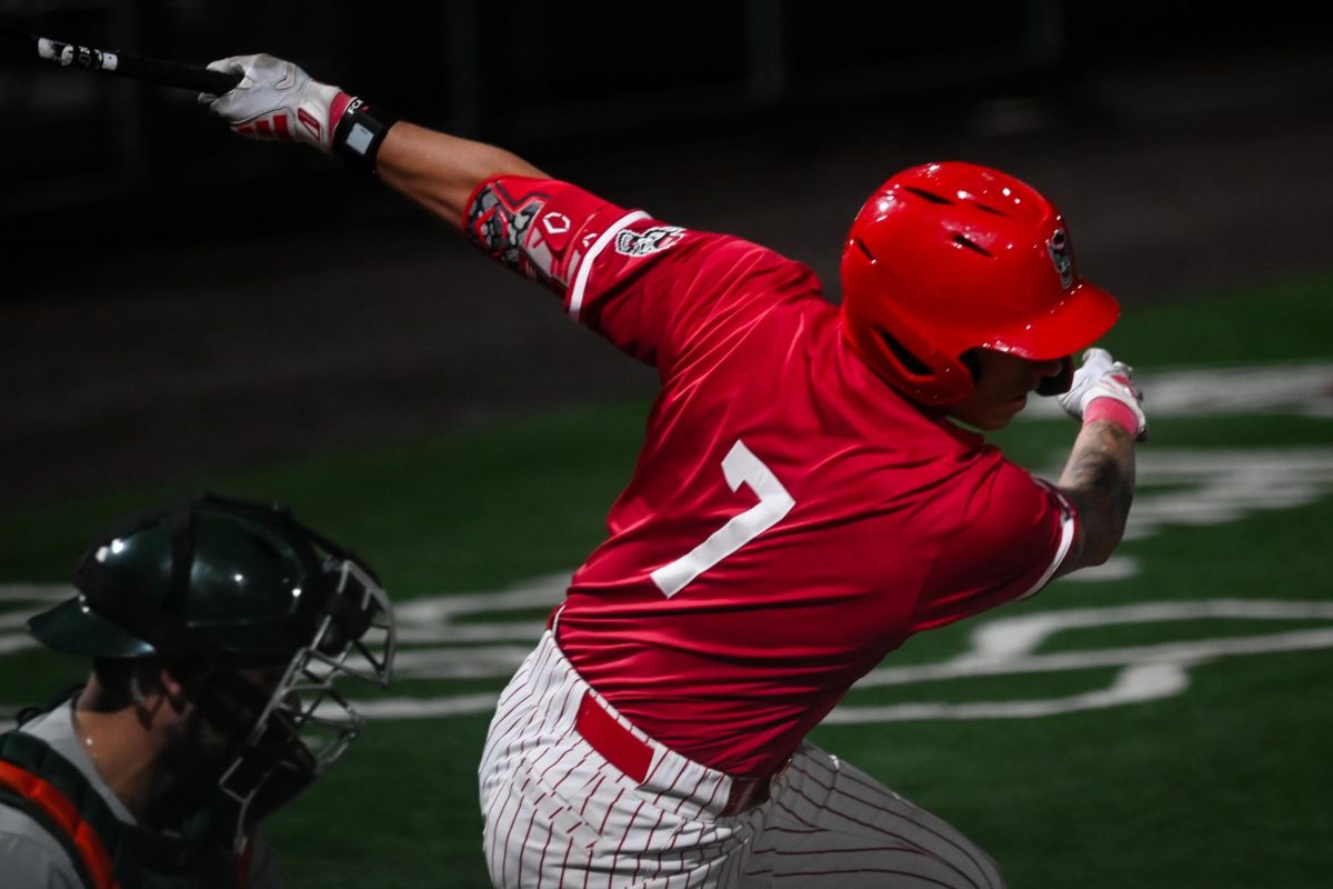 Senior outfielder Brayden Fraasman swings during the second game of the doubleheader against Miami in Doak Field at Dail Park on Friday, May 1, 2026. The Wolfpack beat the Hurricanes 13-6.