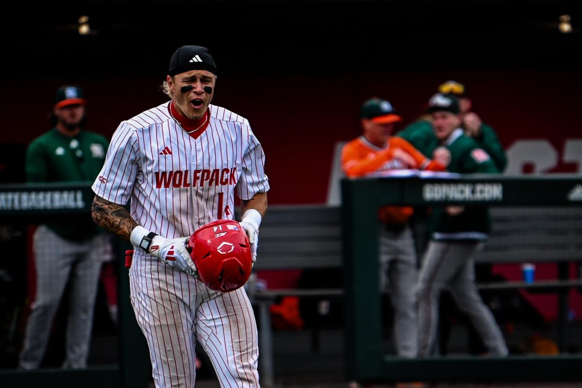 Sophomore outfielder Ty Head laments a call by the umpires during the first game of the doubleheader against Miami in Doak Field at Dail Park on Friday, May 1, 2026. The Hurricanes defeated the Wolfpack 12-9.