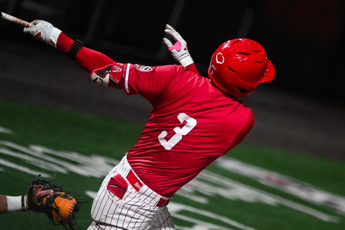 Freshman infielder Christian Serrano swings for a pitch during the second game of the doubleheader against Miami in Doak Field at Dail Park on Friday, May 1, 2026. The Wolfpack beat the Hurricanes 13-6.