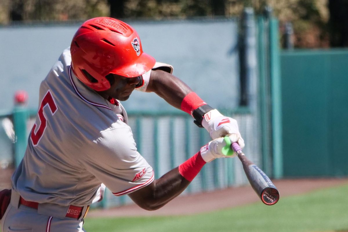 Junior infielder Sherman Johnson checks his swing during the game against Stanford at Klein Field at Sunken Diamond on Sunday, May 10, 2026. Johnson hit a home run and drove in two RBIs in the game. The Cardinal defeated the Wolfpack by a score of 9-5.