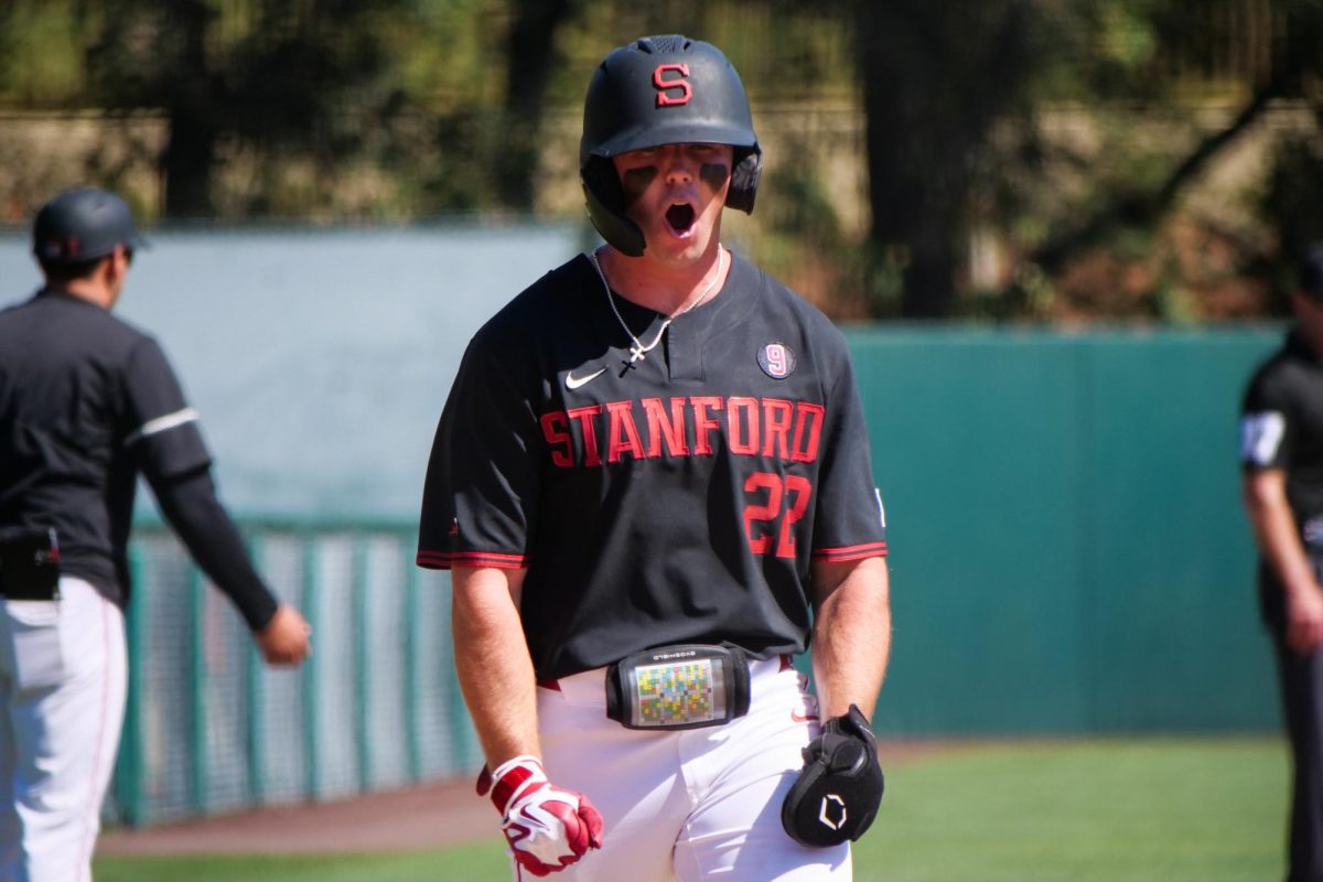 Senior outfielder Cort MacDonald pumps his fists in celebration after his teammate, sophomore infielder JJ Moran, hits a home run during the game against NC State at Klein Field at Sunken Diamond on Sunday, May 10, 2026. The Cardinal defeated the Wolfpack by a score of 9-5.