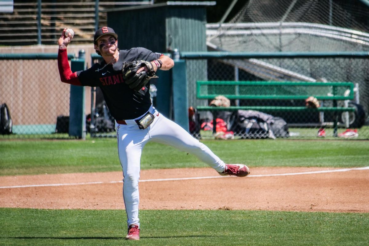 Sophomore infielder JJ Moran throws across his body during the game against NC State at Klein Field at Sunken Diamond on Sunday, May 10, 2026. The Cardinal defeated the Wolfpack by a score of 9-5.