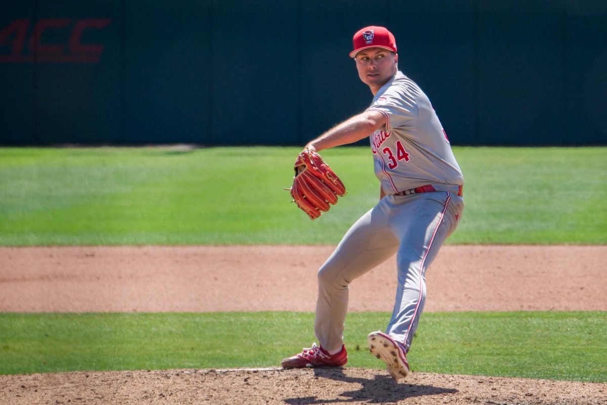 Sophomore right-handed pitcher Anderson Nance winds up to throw a pitch during the game against Stanford at Klein Field at Sunken Diamond on Sunday, May 10, 2026. Nance allowed five earned runs in four and a third innings pitched. The Cardinal defeated the Wolfpack by a score of 9-5.