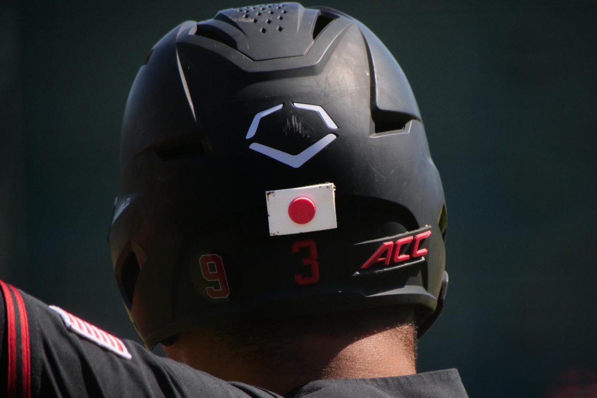 Sophomore infielder Rintaro Sasaki's helmet displays the Japanese flag during the game against NC State at Klein Field at Sunken Diamond on Sunday, May 10, 2026. Sasaki is a native of Hanamaki, Japan. The Cardinal defeated the Wolfpack by a score of 9-5.