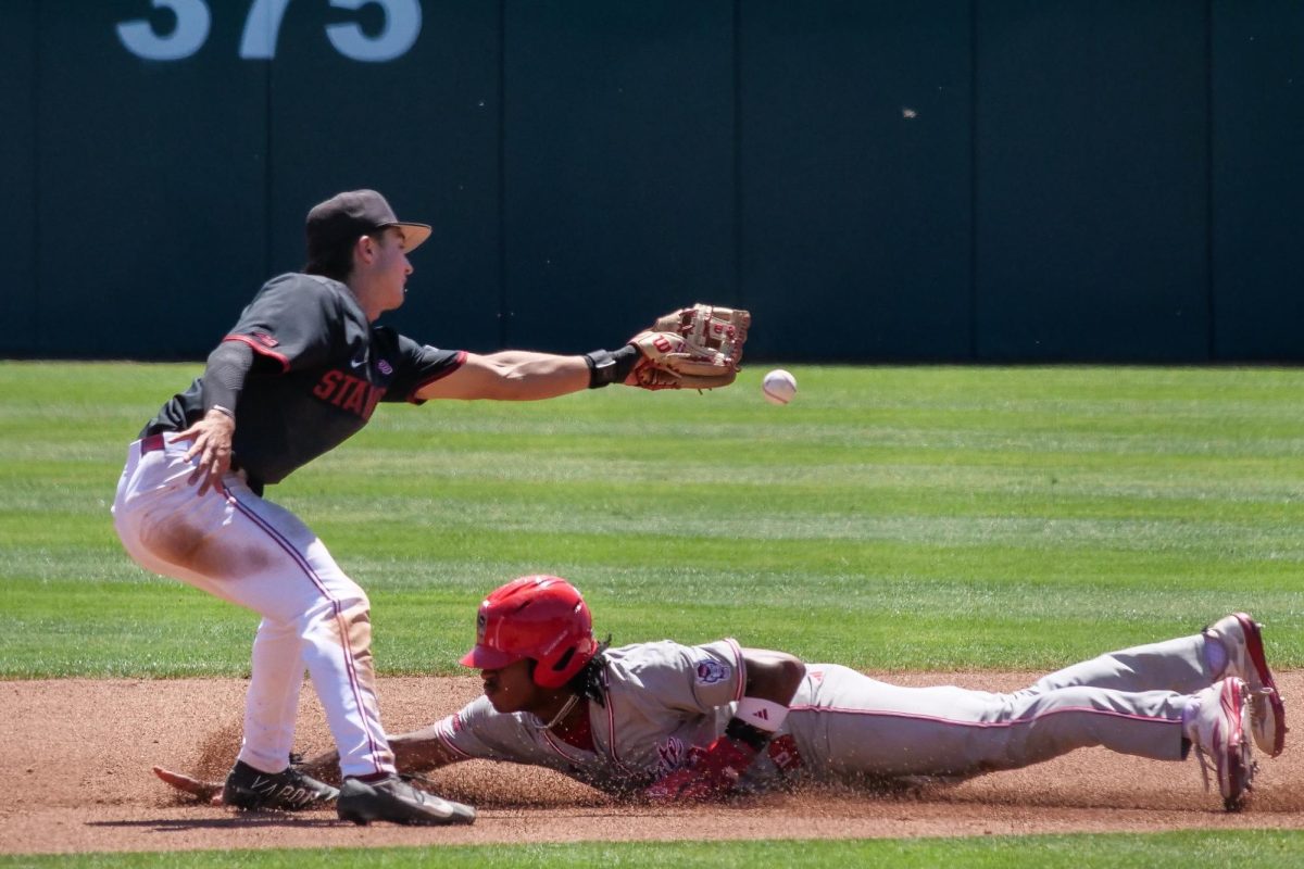 Junior outfielder Andrew Wiggins dives into second ahead of the tag during the game against Stanford at Klein Field at Sunken Diamond on Sunday, May 10, 2026. The Cardinal defeated the Wolfpack by a score of 9-5.