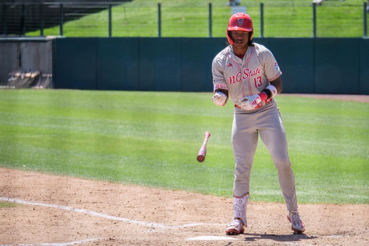 Junior outfielder Andrew Wiggins flips his bat after collecting a walk during the game against Stanford at Klein Field at Sunken Diamond on Sunday, May 10, 2026. The Cardinal defeated the Wolfpack by a score of 9-5.
