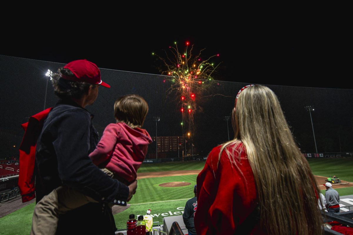 Fans watch the firework show after the game against UNC in Doak Field at Dail Park on Thursday, May 14, 2026. The Tar Heels defeated the Wolfpack 9-4.