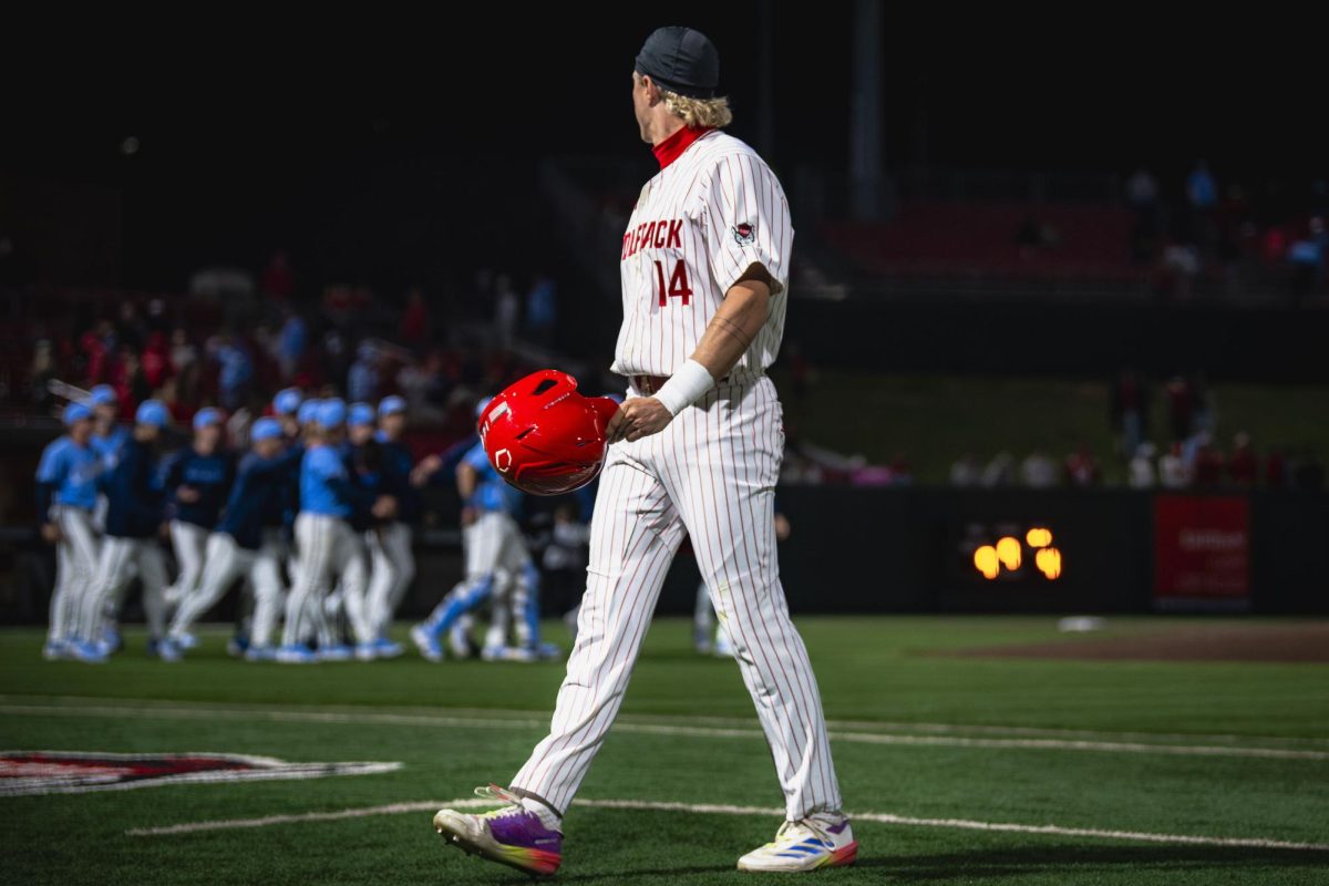 Sophomore outfielder Ty Head walks off the field after making the final out of the game against UNC in Doak Field at Dail Park on Thursday, May 14, 2026. The Tar Heels defeated the Wolfpack 9-4.