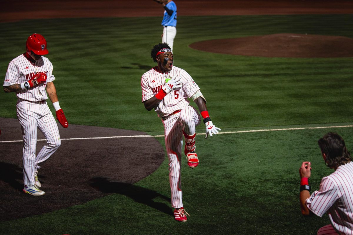 Junior infielder Sherman Johnson celebrates after hitting a home run during the game against UNC in Doak Field at Dail Park on Thursday, May 14, 2026. The Tar Heels defeated the Wolfpack 9-4.